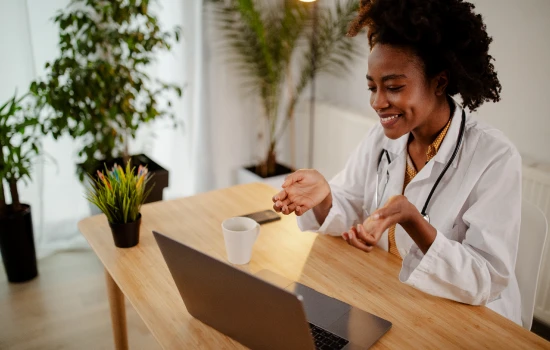 female-general-practitioner-consult-computer