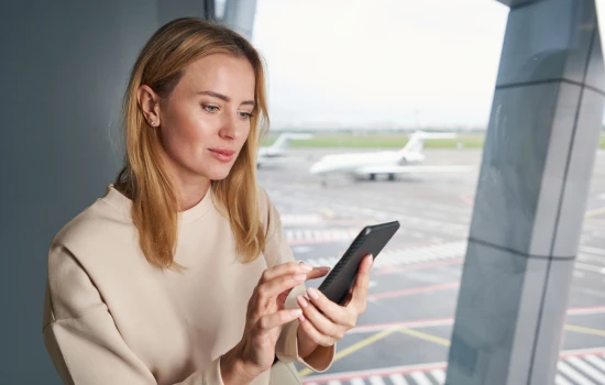 fit-to-fly-letter-traveler-using-consult-phone