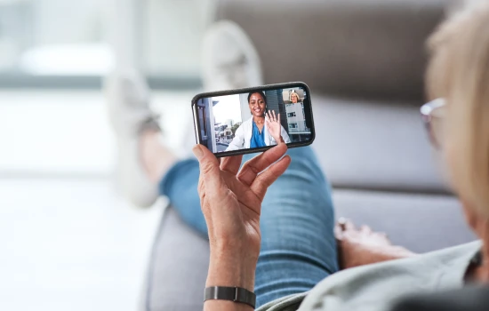senior-woman-using-a-smartphone-to-consult-for-certificate-of-good-health
