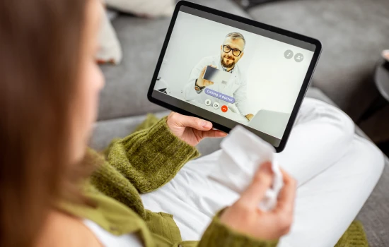 woman-talking-with-a-doctor-online-medicine-travelling-letter