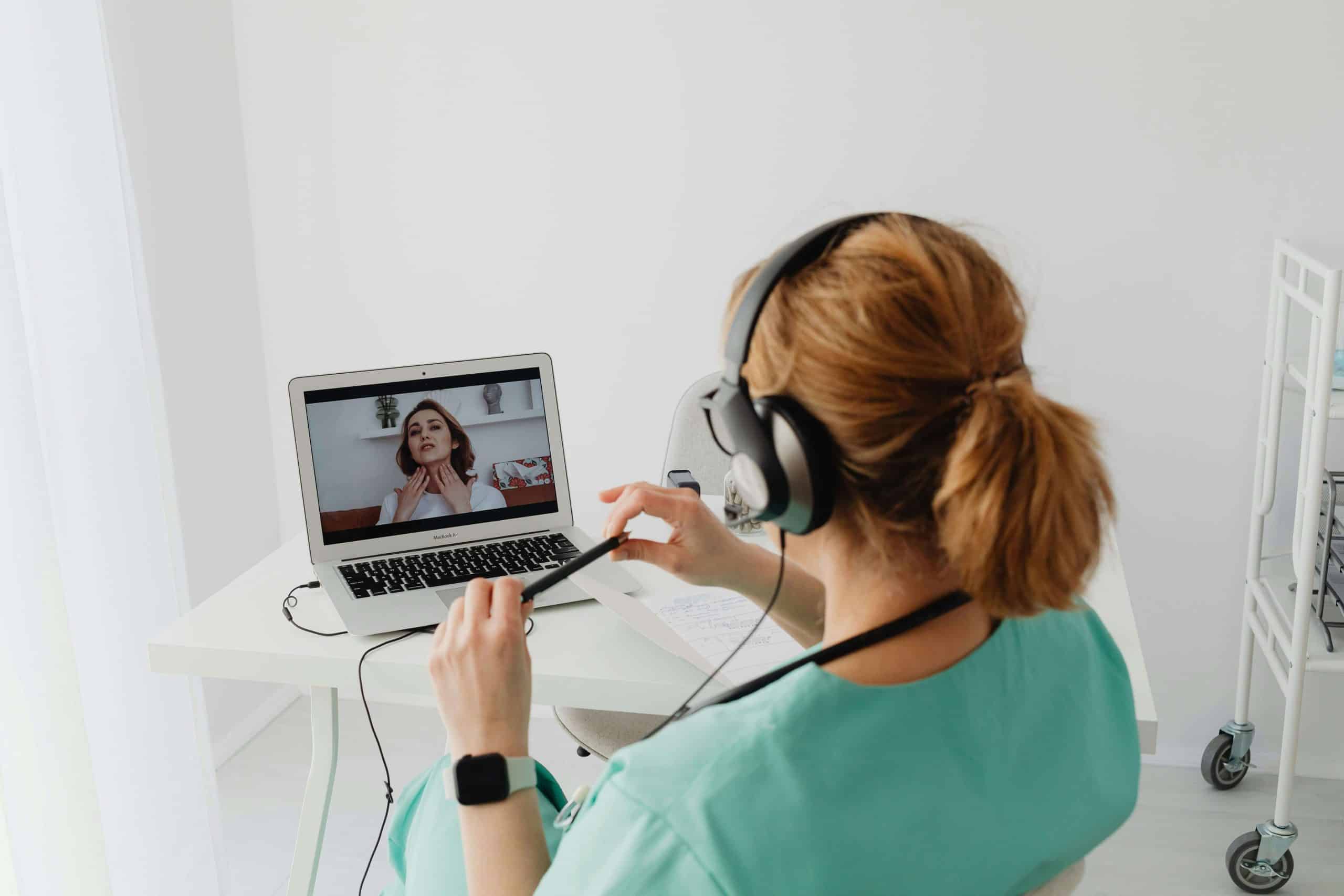Online GP consulting with a patient